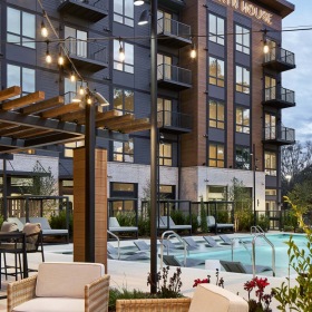 The Essence of Exceptional Living pool with outdoor seating